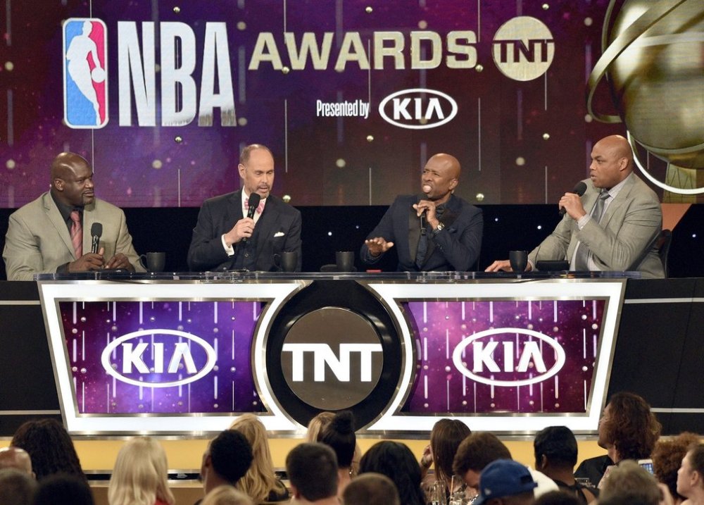 FILE - Shaquille O'Neal, from left, Ernie Johnson, Kenny Smith and Charles Barkley speak at the NBA Awards on Monday, June 25, 2018, at the Barker Hangar in Santa Monica, Calif. (Photo by Chris Pizzello/Invision/AP, File)