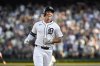 CORRECTS TO KERRY CARPENTER NOT SPENCER TORKELSON - Detroit Tigers' Kerry Carpenter reacts after hitting a home run during the first inning of a baseball game against the Minnesota Twins, Sunday, June 29, 2025, in Detroit. (AP Photo/Jose Juarez)
