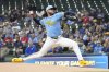 Milwaukee Brewers pitcher Freddy Peralta (51) delivers during the first inning of a baseball game against the St. Louis Cardinals Friday, June 13, 2025, in Milwaukee. (AP Photo/Kayla Wolf)