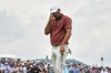 Scottie Scheffler reacts after missing a putt on the first hole during the third round of the U.S. Open golf tournament at Oakmont Country Club Saturday, June 14, 2025, in Oakmont, Pa. (AP Photo/Gene J. Puskar)