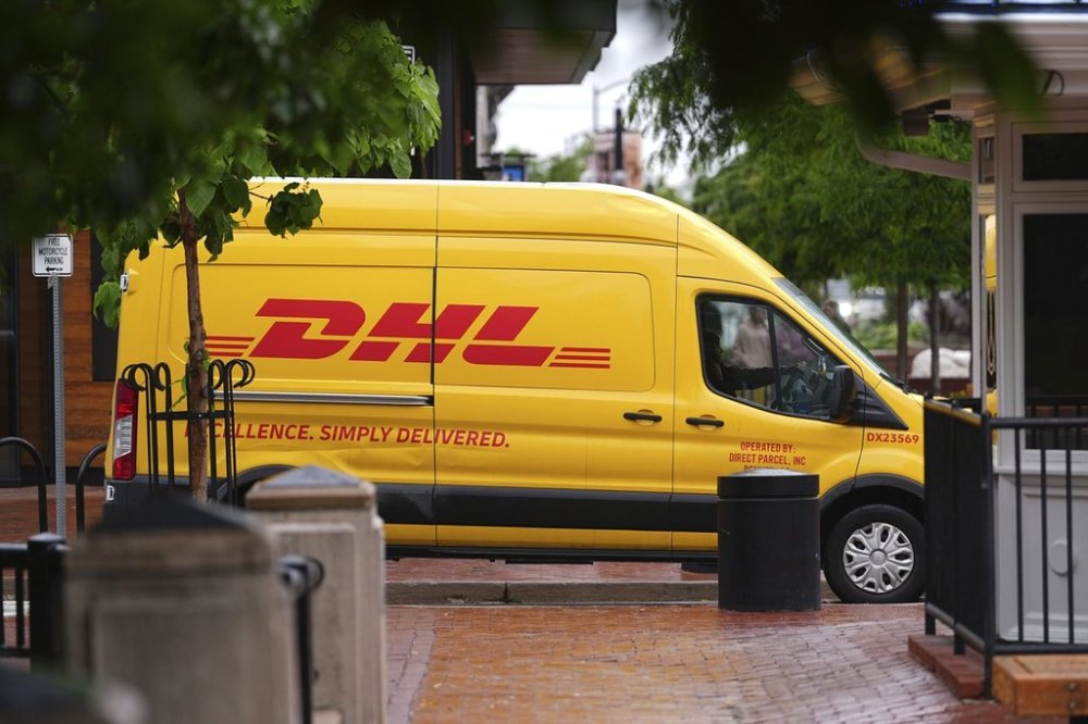 A DHL delivery van Tuesday, June 3, 2025, in Boulder, Colo. (AP Photo/David Zalubowski)