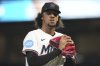 Miami Marlins starting pitcher Eury Perez walks to the dugout after pitching during the first inning of a baseball game against the Minnesota Twins, Thursday, July 3, 2025, in Miami. (AP Photo/Lynne Sladky)