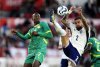 Senegal's Nicolas Jackson, left England's Kyle Walker vie for the ball,during an international friendly match against Senegal, at The City Ground, in Nottingham, England, Tuesday, June 10, 2025. (Nick Potts/PA via AP)