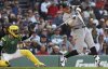New York Yankees' Aaron Judge takes a swinging strike during the first inning of a baseball game against the Boston Red Sox, Friday, June 13, 2025, in Boston. (AP Photo/Jim Davis)