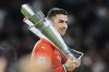 Portugal's Cristiano Ronaldo holds the trophy after winning the Nations League soccer championship at the Allianz Arena in Munich, Germany, Sunday, June 8, 2025. (AP Photo/Martin Meissner)