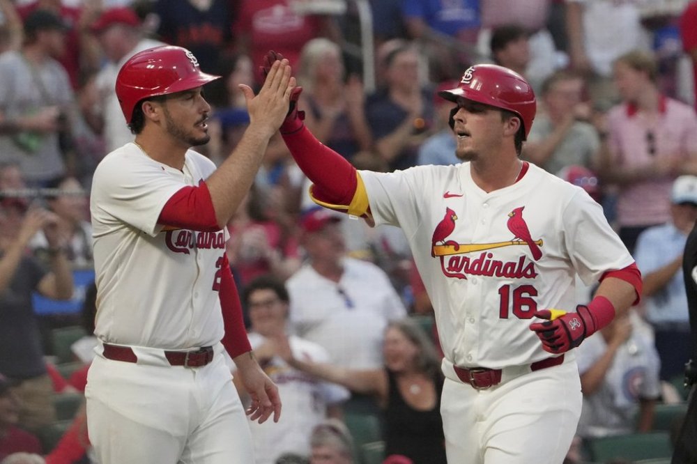 St. Louis Cardinals' Nolan Gorman (16) is congratulated by teammate Nolan Arenado after hitting a two-run home run during the sixth inning of a baseball game against the Chicago Cubs Monday, June 23, 2025, in St. Louis. (AP Photo/Jeff Roberson)