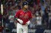 Cleveland Guardians' Jose Ramirez watches his game winning single off Toronto Blue Jays relief pitcher Mason Fluharty at the end of the 10th inning of a baseball game, Wednesday, June 25, 2025, in Cleveland. (AP Photo/Phil Long)
