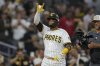 San Diego Padres' Martín Maldonado celebrates after hitting a home run during the fifth inning of a baseball game against the Washington Nationals Tuesday, June 24, 2025, in San Diego. (AP Photo/Gregory Bull)