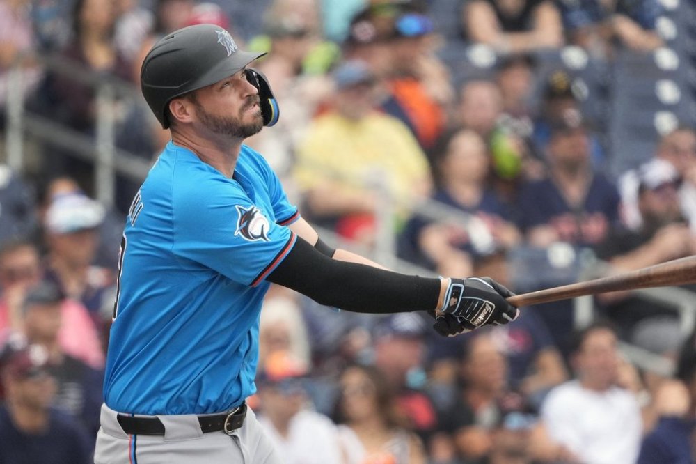 FILE - Miami Marlins' Trey Mancini watches his solo home run during the second inning of a spring training baseball game against the Houston Astros, March 10, 2024, in West Palm Beach, Fla. (AP Photo/Jeff Roberson, File)