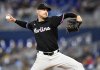Miami Marlins pitcher Janson Junk throws to an Atlanta Braves hitter during the first inning of a baseball game, Friday, June 20, 2025, in Miami. (AP Photo/Michael Laughlin)