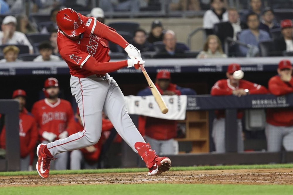 Los Angeles Angels' Christian Moore hits a triple during the eighth inning of a baseball game against the New York Yankees, Monday, June 16, 2025, in New York. (AP Photo/Pamela Smith)