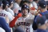 IHouston Astros' Yainer Diaz (21) celebrates in the dugout after hitting a two-run home run against the Minnesota Twins during the third inning of a baseball game Saturday, June 14, 2025, in Houston. (AP Photo/David J. Phillip)
