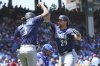Seattle Mariners' Cal Raleigh, right, celebrates with J.P. Crawford after hitting a two-run home run during the first inning of a baseball game against the Chicago Cubs in Chicago, Sunday, June 22, 2025. (AP Photo/Nam Y. Huh)