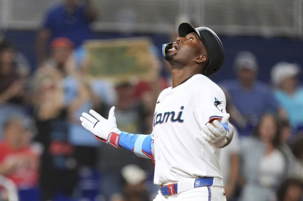 Miami Marlins' Jesus Sanchez celebrates as he runs to home after centering on a line drive in the seventh inning of a baseball game against the Philadelphia Phillies, Tuesday, June 17, 2025, in Miami. (AP Photo/Rebecca Blackwell)