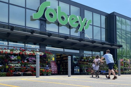 Sobeys parent company Empire Co. Ltd. has officially signed on as the first retailer member of Canada's grocery code of conduct, as work continues to develop governance rules for its members ahead of a full implementation by Jan. 1. Shoppers at a west-end Toronto Sobeys grocery store, Sunday, June 26, 2023. THE CANADIAN PRESS/Graeme Roy