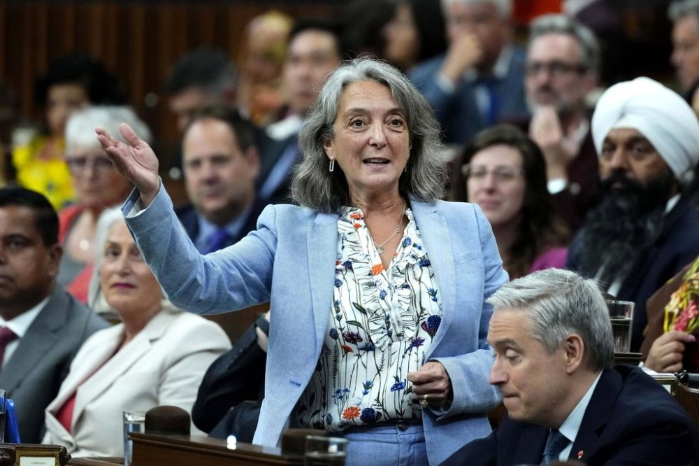 Minister of Environment and Climate Change Julie Dabrusin rises during question period in the House of Commons on Parliament Hill in Ottawa on Tuesday, June 17, 2025. THE CANADIAN PRESS/Justin Tang