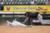 Chicago White Sox's Ryan Noda, left, avoids getting tagged out by Arizona Diamondbacks second baseman Ketel Marte (4) during the seventh inning of a baseball game Wednesday, June 25, 2025, in Chicago. (AP Photo/Erin Hooley)