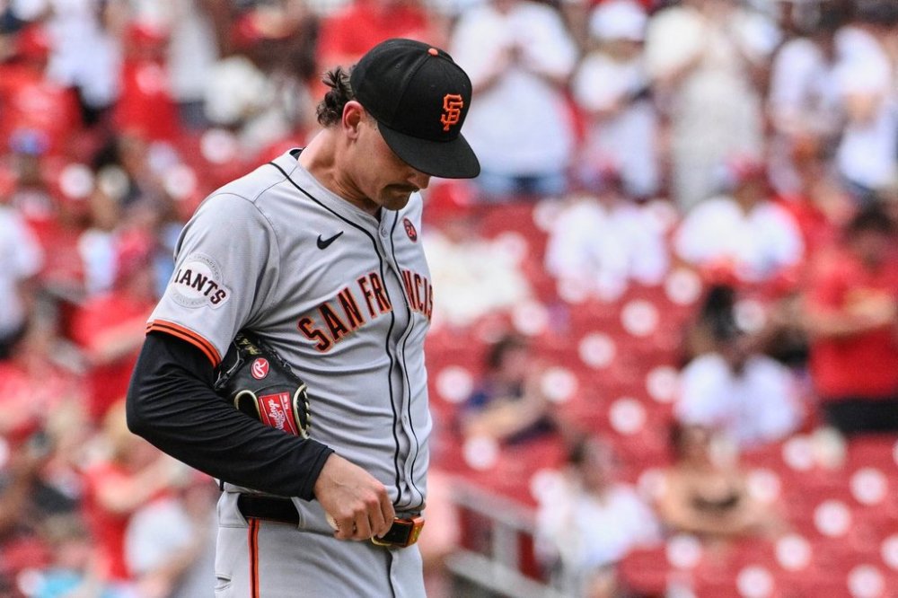 FILE - San Francisco Giants relief pitcher Sean Hjelle steps off the mound after giving up a two-run home run to St. Louis Cardinals' Alec Burleson in the sixth inning of a baseball game, Saturday June 22, 2024, in St. Louis. (AP Photo/Joe Puetz, File)