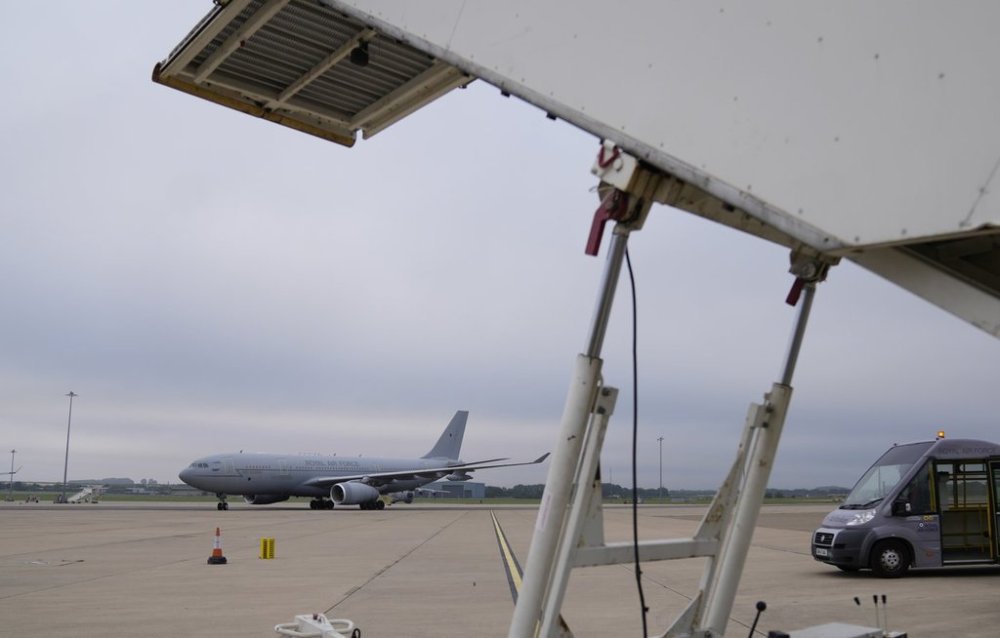 FILE - A British Royal Airforce Voyager aircraft carrying members of the British armed forces 16 Air Assault Brigade arrives at Brize Norton, England, Saturday, Aug. 28, 2021. (AP Photo/Alastair Grant, Pool, File)