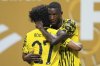 Borussia Dortmund's Serhou Guirassy, right, celebrates with teammate Karim Adeyemi after scoring his team's second goal during the Club World Cup round of 16 soccer match between Borussia Dortmund and CF Monterrey in Atlanta, Tuesday, July 1, 2025. (AP Photo/Mike Stewart)
