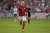 FILE - Denmark's Pernille Harder runs with the ball during the Women Euro 2022 group B soccer match between Denmark and Spain at Brentford Community Stadium in London, England, Saturday, July 16, 2022. (AP Photo/Alessandra Tarantino, File)