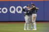 Tampa Bay Rays outfielders Jake Mangum, left, Kameron Misner, center, and Josh Lowe, right, react after defeating the New York Mets in a baseball game Sunday, June 15, 2025, in New York. (AP Photo/Pamela Smith)