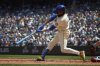 Seattle Mariners' J.P. Crawford hits a grand slam off Cleveland Guardians starting pitcher Luis L. Ortiz during the second inning of a baseball game Sunday, June 15, 2025, in Seattle. (AP Photo/John Froschauer)