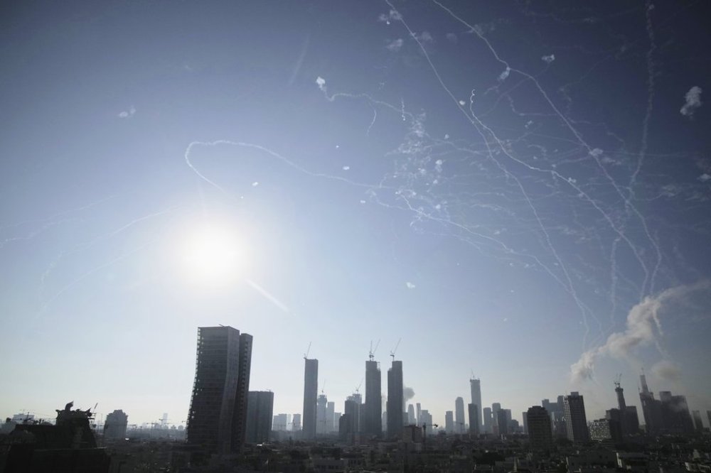 Israeli air defense system fires to intercept missiles during an Iranian attack over Tel Aviv, Israel, Thursday, June 19, 2025. (AP Photo/Leo Correa)
