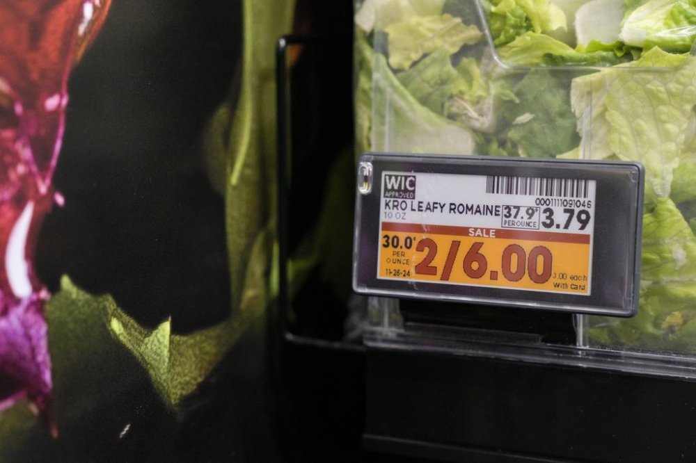 Electronic grocery labels are displayed at a Kroger grocery store, in Monroe, Ohio, Nov. 13, 2024. (AP Photo/Jeff Dean)