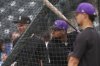 Colorado Rockies outfielder Yanquiel Fernández warms up before a baseball game against the Houston Astros, Tuesday, July 1, 2025, in Denver. (AP Photo/David Zalubowski)