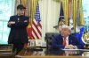 FILE - President Donald Trump, right, speaks during a news conference with Elon Musk in the Oval Office of the White House, Friday, May 30, 2025, in Washington. (AP Photo/Evan Vucci, File)