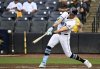 Tampa Bay Rays' Josh Lowe hits a single during the third inning of a baseball game against the Athletics, Wednesday, July 2, 2025, in Tampa, Fla. (AP Photo/Jason Behnken)