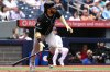 Arizona Diamondbacks third baseman Eugenio Suarez (28) hits a two-RBI double against the Toronto Blue Jays in third inning MLB baseball action in Toronto, Thursday, June 19, 2025. THE CANADIAN PRESS/Jon Blacker