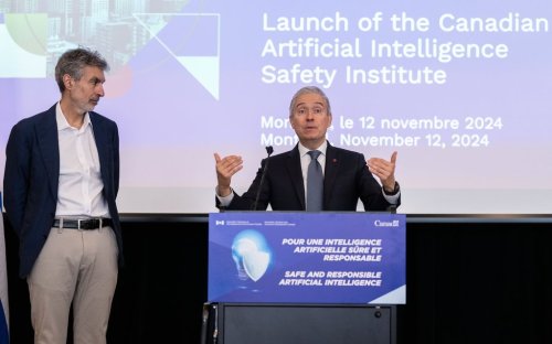 Innovation, Science and Industry Minister Francois-Philippe Champagne, right, and founder and scientific director of MILA-Quebec Artificial Intelligence Institute Yoshua Bengio answer media questions following the launch the Canadian Artificial Intelligence Safety Institute in Montreal on Tuesday, Nov. 12, 2024. THE CANADIAN PRESS/Christinne Muschi