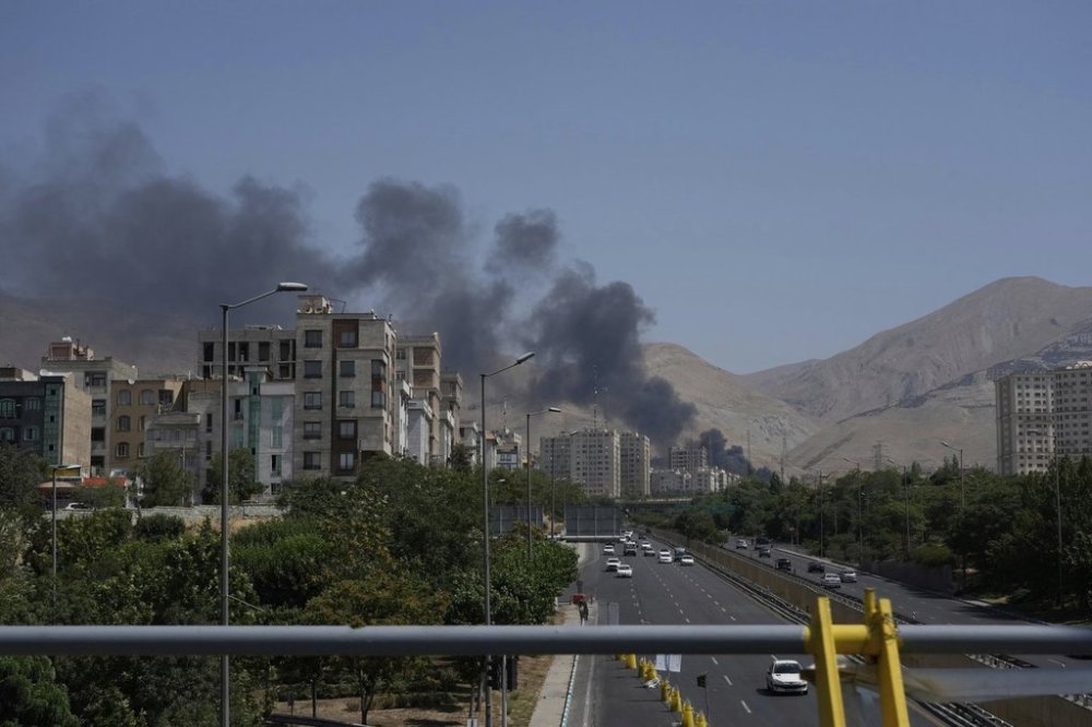 Smoke rises from an oil storage facility after it appeared to have been struck by an Israeli strike on Saturday, in Tehran, Iran, Monday, June 16, 2025. (AP Photo/Vahid Salemi)(AP Photo/Vahid Salemi)