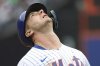 New York Mets' Pete Alonso reacts after Tampa Bay Rays second baseman Brandon Lowe threw the ball to first baseman Jonathan Aranda to put him out during the sixth inning of a baseball game Sunday, June 15, 2025, in New York. (AP Photo/Pamela Smith)