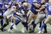 Winnipeg Blue Bombers' Brady Oliveira (20) runs for the first down during first half CFL action against the BC Lions in Winnipeg, Thursday, June 12, 2025. THE CANADIAN PRESS/John Woods