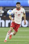 Canada's Jonathan Osorio controls the ball during the first half of a CONCACAF Nations League semifinal soccer match against Mexico Thursday, March 20, 2025, in Inglewood, Calif. (AP Photo/Etienne Laurent)