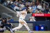 Toronto Blue Jays outfielder Alan Roden (18) hits his first career home run against the Atlanta Braves during fifth inning MLB baseball action in Toronto on Tuesday, April 15, 2025. THE CANADIAN PRESS/Thomas Skrlj