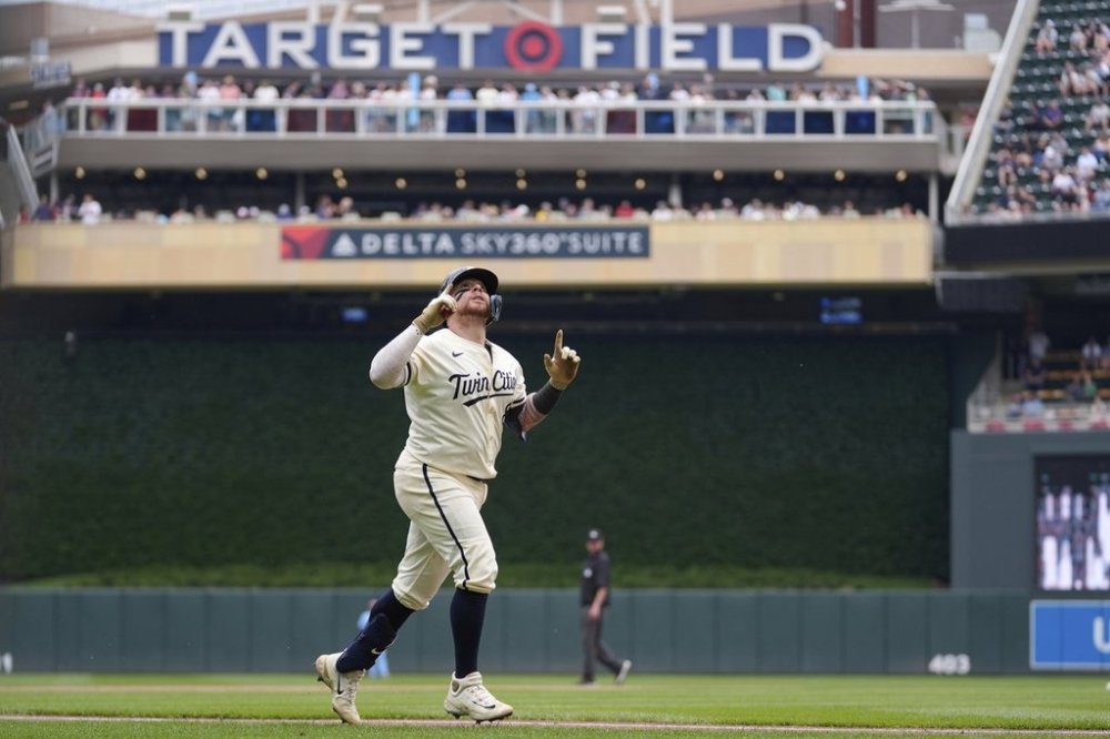 Minnesota Twins' Christian Vazquez (8) runs the bases after hitting a solo home run during the fourth inning of a baseball game against the Toronto Blue Jays, Sunday, June 8, 2025, in Minneapolis. (AP Photo/Abbie Parr)