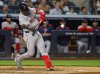 Boston Red Sox's catcher Carlos Narváez hits a three run home run against the New York Yankees during the sixth inning of a baseball game, Sunday, June 8, 2025, in New York. (AP Photo/Noah K. Murray)