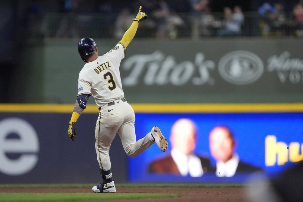 Milwaukee Brewers' Joey Ortiz rounds the bases after hitting a solo home run during the fourth inning of a baseball game against the Pittsburgh Pirates, Tuesday, June 24, 2025, in Milwaukee. (AP Photo/Aaron Gash)