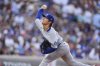 Los Angeles Dodgers starting pitcher Yoshinobu Yamamoto works against the Colorado Rockies in the first inning of a baseball game Wednesday, June 25, 2025, in Denver. (AP Photo/David Zalubowski)