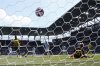 Borussia Dortmund's Daniel Svensson, background right, scores his side's opening goal against Ulsan HD's Jo Hyeon-woo during the Club World Cup Group F soccer match between Borussia Dortmund and Ulsan in Cincinnati, Wednesday, June 25, 2025. (AP Photo/Jeff Dean)