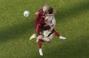 Toronto FC's Ola Brynhildsen (left) challenges New York Red Bulls' Daniel Edelman (75) for a header during first half MLS action in Toronto, on Wednesday, June 25, 2025.THE CANADIAN PRESS/Chris Young