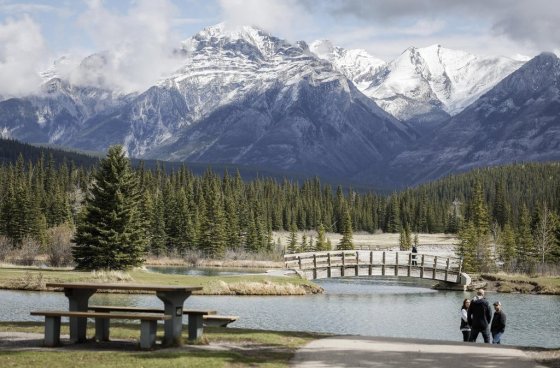 Visitors explore Cascade Ponds in Banff National Park, Alta., in May. (Jeff McIntosh / The Canadian Press files)