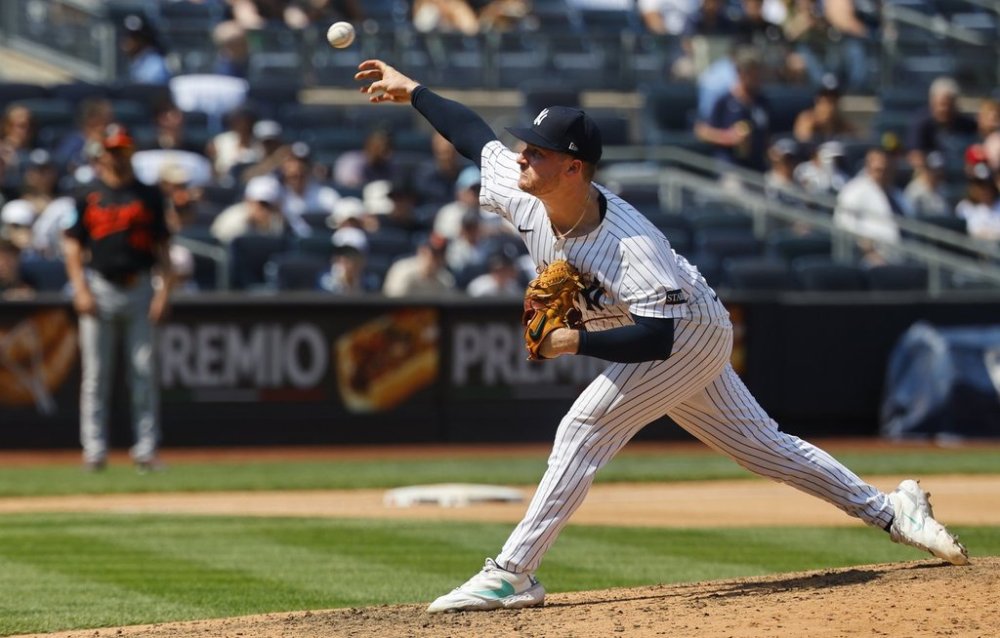 New York Yankees pitcher Clarke Schmidt throws during the seventh inning of a baseball game against the Baltimore Orioles, Saturday, June 21, 2025, in New York. (AP Photo/Noah K. Murray)