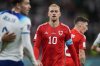 FILE - Wales' Aaron Ramsey walks along the pitch at the end of the World Cup group B soccer match between England and Wales, at the Ahmad Bin Ali Stadium in Al Rayyan , Qatar, Tuesday, Nov. 29, 2022. England won 3-0. (AP Photo/Frank Augstein, File)
