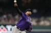 Colorado Rockies starting pitcher German Marquez throws to the Washington Nationals during the first inning of a baseball game at Nationals Park, Wednesday, June 18, 2025, in Washington. (AP Photo/Jess Rapfogel)