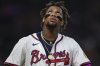 Atlanta Braves' Ronald Acuña Jr. reacts after the eighth inning of a baseball game against the Los Angeles Angels, Thursday, July 3, 2025, in Atlanta. (AP Photo/Colin Hubbard)